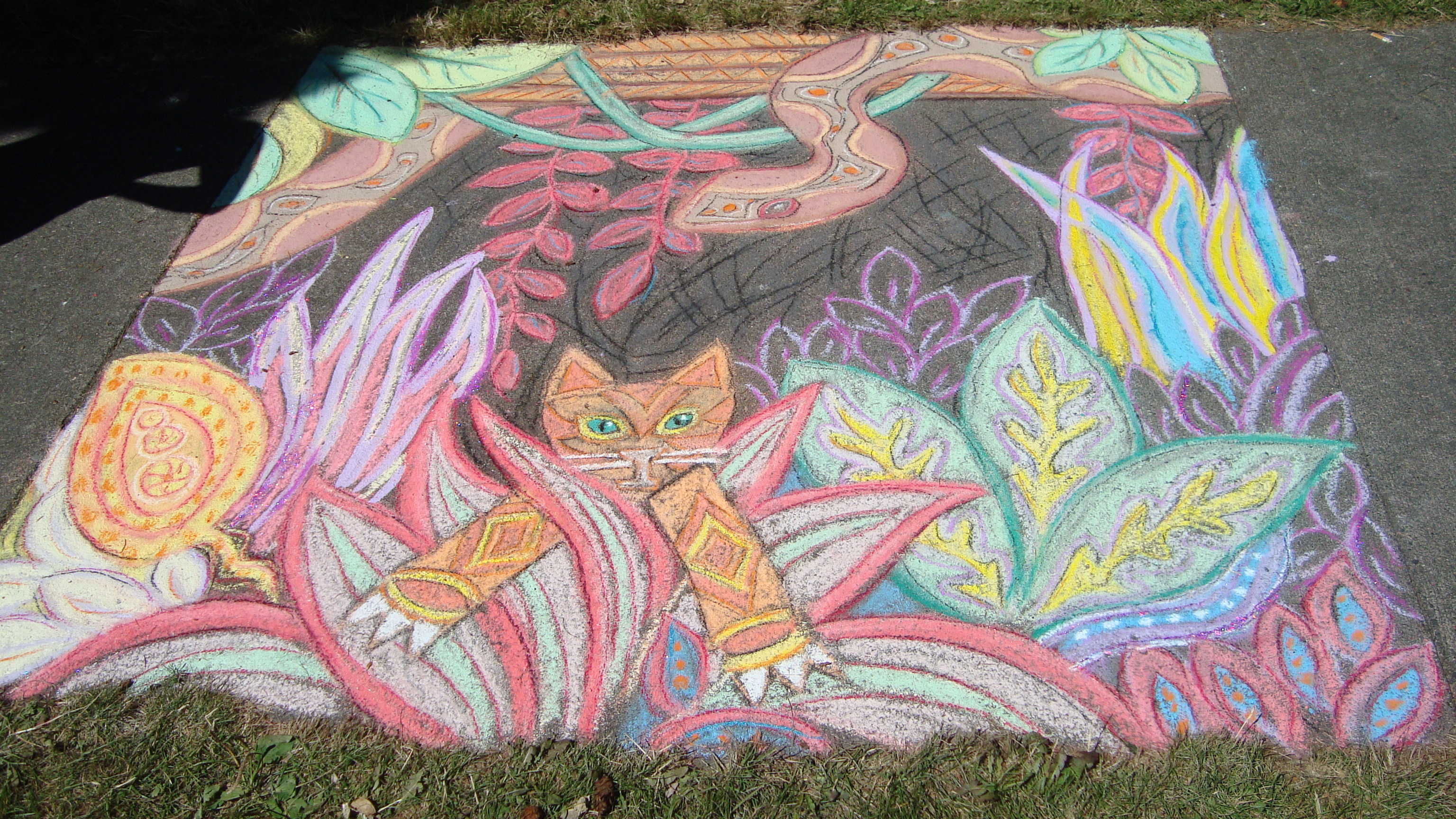 A chalk drawing of a orange cat peeking out from a plant. 